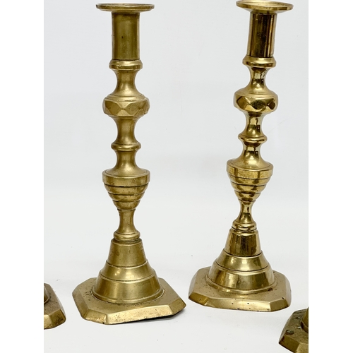 387 - 3 pairs of Victorian brass candlesticks. 24cm.