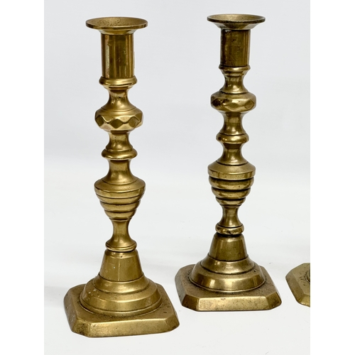 387 - 3 pairs of Victorian brass candlesticks. 24cm.