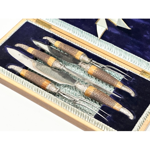 82 - A late 19th century silver mounted James Deakin & Sons carving set in case. 46.5x23cm