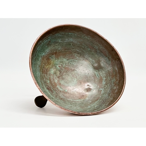 83 - A late 19th century Art & Crafts copper bowl raised on 3 brass feet. Circa 1890. 20.5x7.5cm