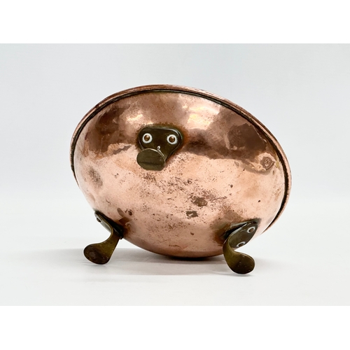 83 - A late 19th century Art & Crafts copper bowl raised on 3 brass feet. Circa 1890. 20.5x7.5cm