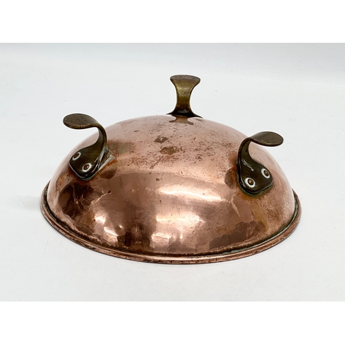 83 - A late 19th century Art & Crafts copper bowl raised on 3 brass feet. Circa 1890. 20.5x7.5cm