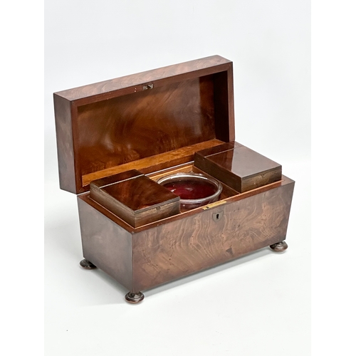 41 - A Regency mahogany sarcophagus tea caddy. Circa 1810. 31x15x19.5cm