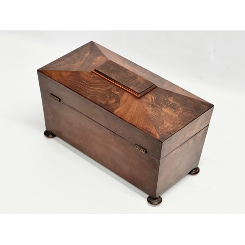 41 - A Regency mahogany sarcophagus tea caddy. Circa 1810. 31x15x19.5cm