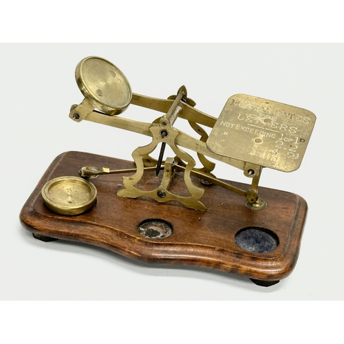 87 - A 19th century Sampson Mordan & Co brass scales and other, Postal Rates for Letters. 20cm.