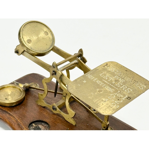 87 - A 19th century Sampson Mordan & Co brass scales and other, Postal Rates for Letters. 20cm.