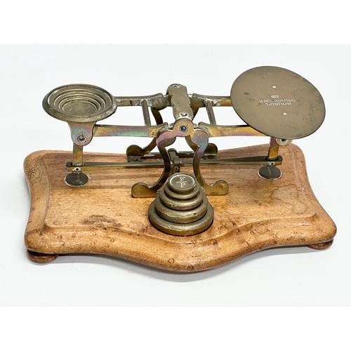 87 - A 19th century Sampson Mordan & Co brass scales and other, Postal Rates for Letters. 20cm.