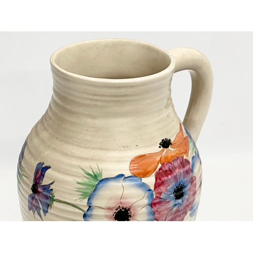 101 - A 1930’s Clarice Cliff ‘Anemone’ Lotus jug. Designed for Newport Pottery. 30cm