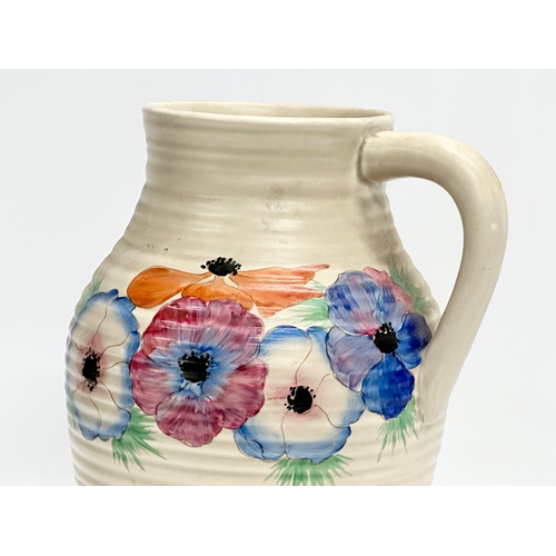 101 - A 1930’s Clarice Cliff ‘Anemone’ Lotus jug. Designed for Newport Pottery. 30cm