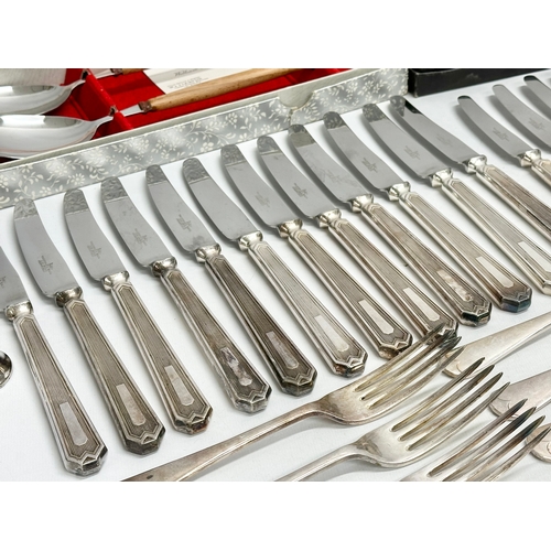 373 - A collection of good quality late 19th century Walker & Hall silver plated cutlery and 4 boxes of vi... 