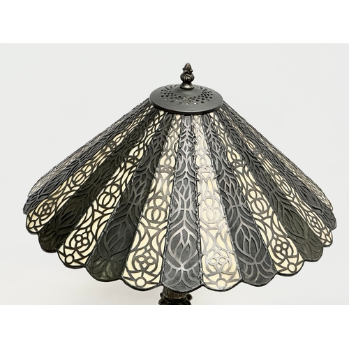 367 - A large Tiffany style lamp. 44x57cm