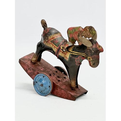 434 - A vintage ‘Peter Pan’ series Stubborn mechanical rocking clown on horse. 15x17cm