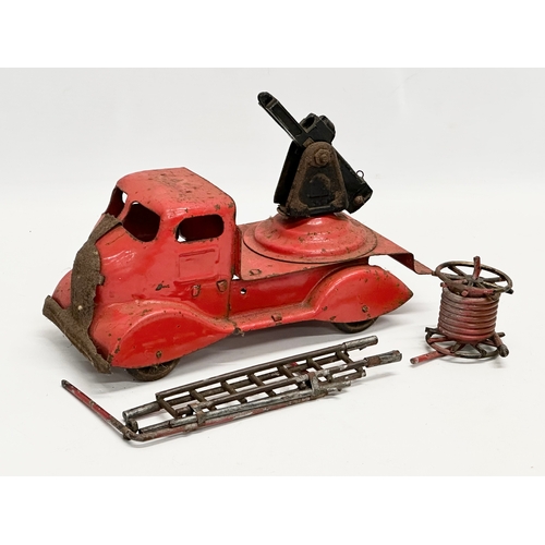 436 - A vintage Tri-ang tin plate fire truck. 24cm