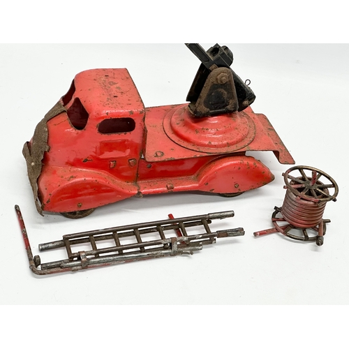 436 - A vintage Tri-ang tin plate fire truck. 24cm