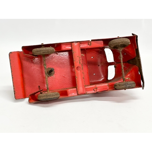 436 - A vintage Tri-ang tin plate fire truck. 24cm