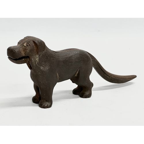 437 - A late 19th century cast iron dog nutcracker. 22cm