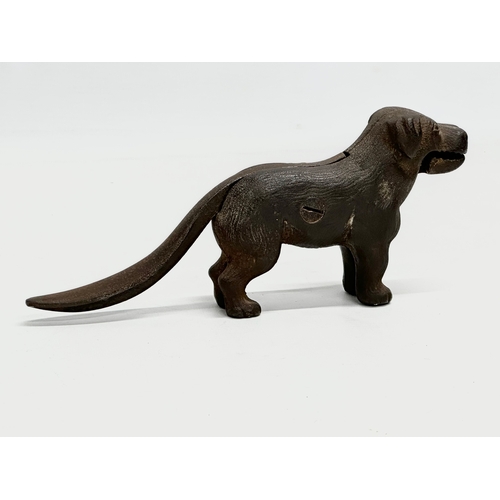 437 - A late 19th century cast iron dog nutcracker. 22cm