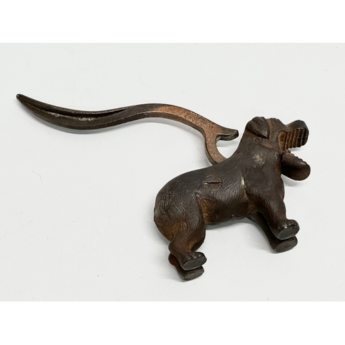 437 - A late 19th century cast iron dog nutcracker. 22cm