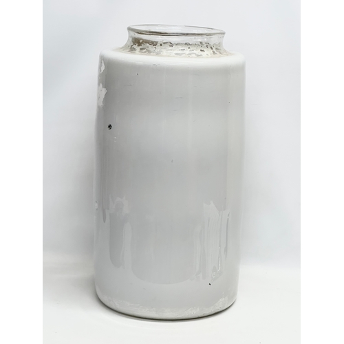 134 - A very large mid 19th century Arrowroot glass pharmacist jar/chemist jar. Treble & Son. 32x64cm