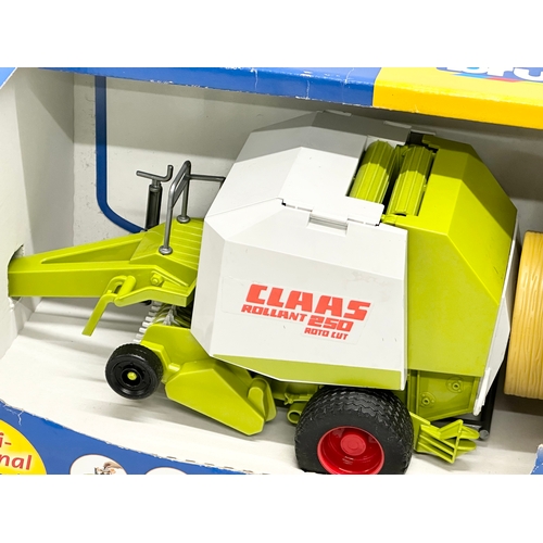 441 - A Bruder Claas Rollant 250 Roto Cut in box. 38x19x21cm