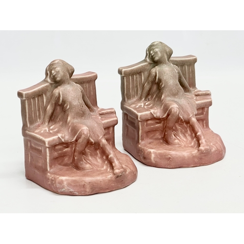 43 - A pair of rare early 20th century Rookwood bookends. Circa 1910-1920. 11x11x14cm