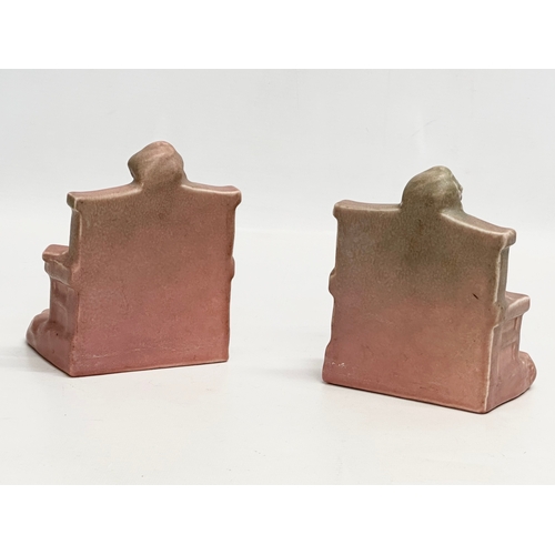 43 - A pair of rare early 20th century Rookwood bookends. Circa 1910-1920. 11x11x14cm