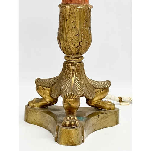 427 - A good quality early 20th century French Empire style brass table lamp with 3 paw feet. Circa 1920. ... 