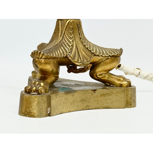 427 - A good quality early 20th century French Empire style brass table lamp with 3 paw feet. Circa 1920. ... 