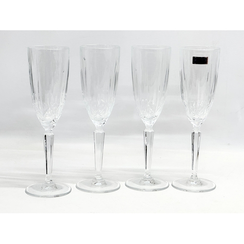 463 - A set of 4 Waterford Marquis ‘Sparkle’ champagne flute glasses with box. 24cm