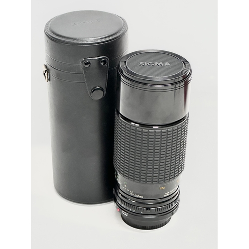 443 - A Sigma Zoom II Multi-coated camera lens with box and case. 5924621