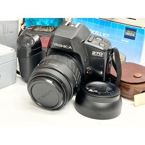 502 - A Yashiba 270 Auto Focus camera, Polaroid Flashgun etc