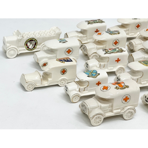 422 - A collection of early 20th century crested china WWI WD trucks and nurses. Including a Nurse Cavell ... 