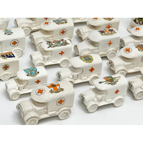 422 - A collection of early 20th century crested china WWI WD trucks and nurses. Including a Nurse Cavell ... 