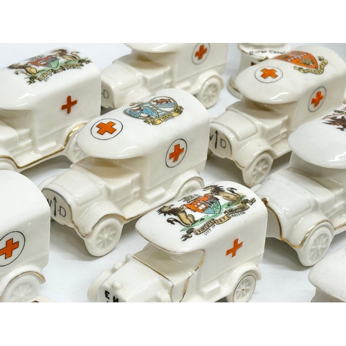 422 - A collection of early 20th century crested china WWI WD trucks and nurses. Including a Nurse Cavell ... 