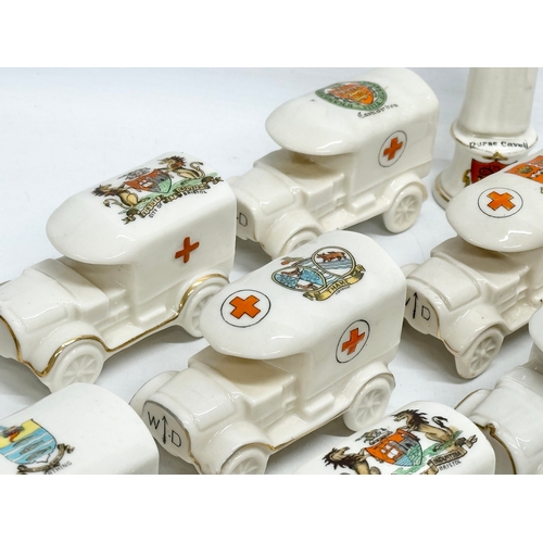 422 - A collection of early 20th century crested china WWI WD trucks and nurses. Including a Nurse Cavell ... 