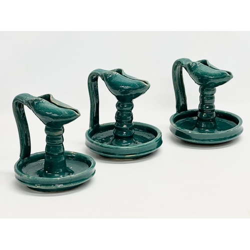 211 - A set of 3 vintage Moroccan glazed stoneware oil lamps. 17x17x18cm