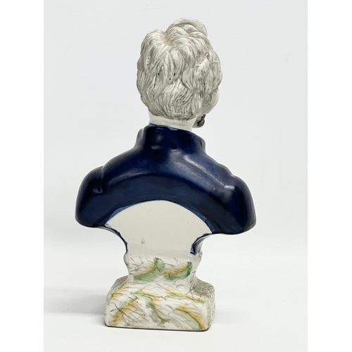 446 - A vintage Staffordshire pottery bust of President Abraham Lincoln. 14x24cm.