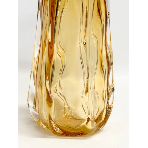 235 - A vintage Amber Glass vase. 12x28cm