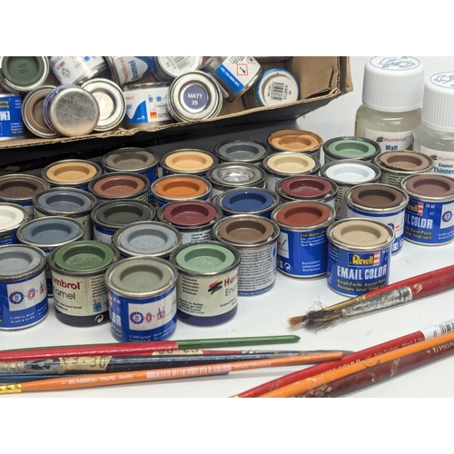 510 - A collection of paints, paintbrushes, and 2 Humbrol Matt Cote, a Humbrol Enamel Thinner. Paint brand... 