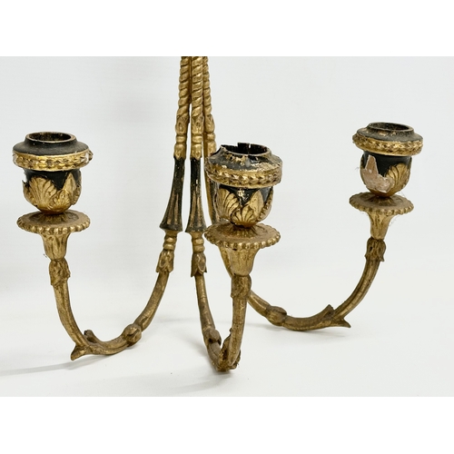 105 - A pair of 19th century gilt 3 branch wall sconces. 27x42cm