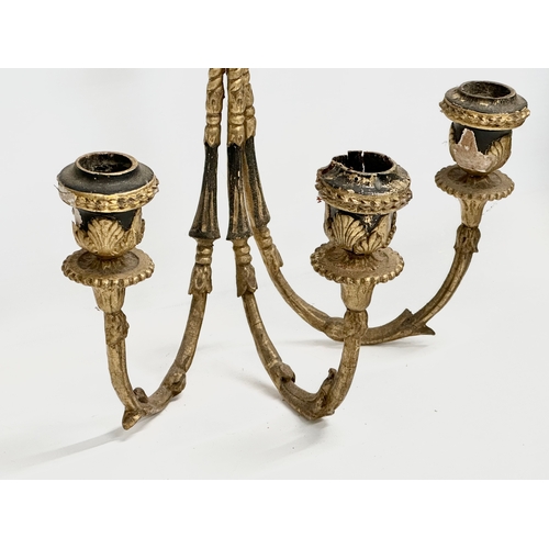 105 - A pair of 19th century gilt 3 branch wall sconces. 27x42cm