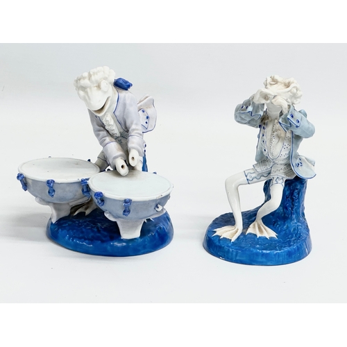 263 - 2 late 19th century Sitzendorf porcelain ‘Frog Band’ figurines. Circa 1884-1902. 11x10x13cm