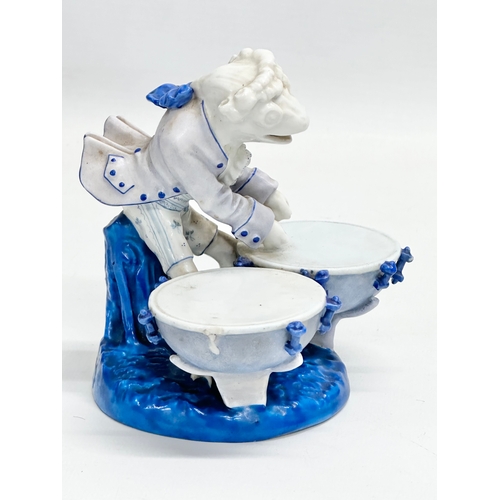 263 - 2 late 19th century Sitzendorf porcelain ‘Frog Band’ figurines. Circa 1884-1902. 11x10x13cm