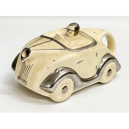 264 - A rare 1930’s Art Deco James Sadler ‘Racing Car’ teapot. 22x11x12cm