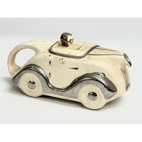 264 - A rare 1930’s Art Deco James Sadler ‘Racing Car’ teapot. 22x11x12cm