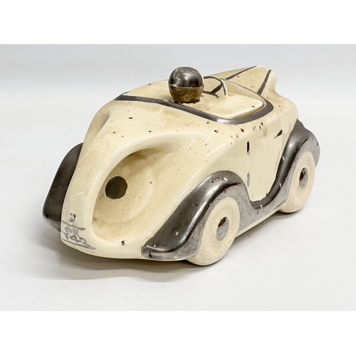 264 - A rare 1930’s Art Deco James Sadler ‘Racing Car’ teapot. 22x11x12cm