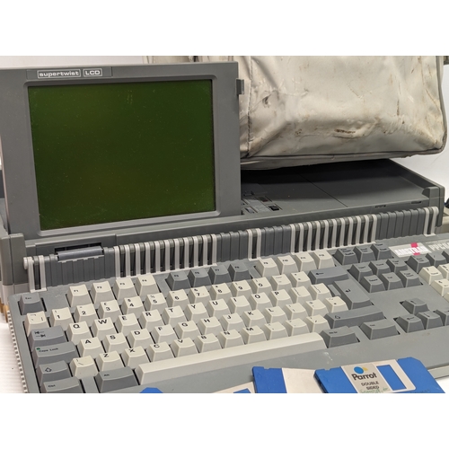 516 - A vintage Amstrad Portable Computer System model PPC640, circa 1989. Including Amstrad AC adapter, d... 