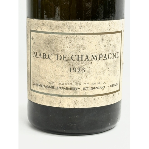 447 - A magnum of Marc De Champagne 1923. Champagne Pommery Et Greno Reims.