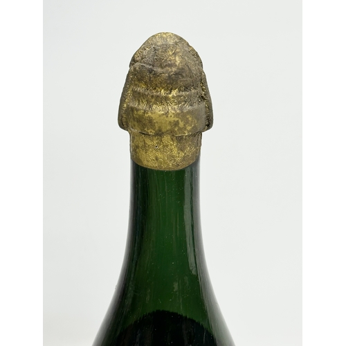 447 - A magnum of Marc De Champagne 1923. Champagne Pommery Et Greno Reims.