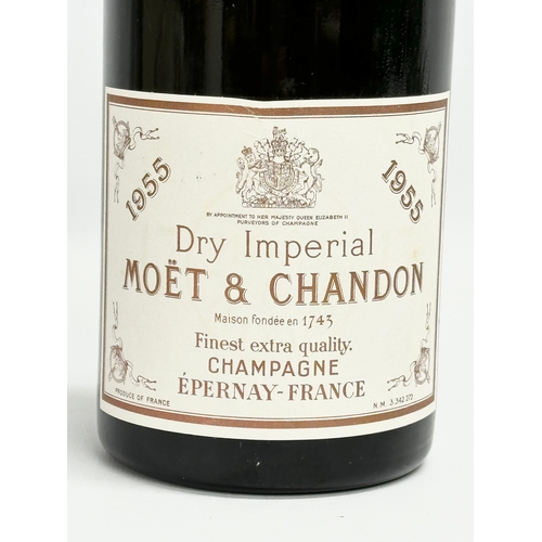 448 - A bottle of Moet & Chandon Dry Imperial champagne. 1955. Finest Extra Quality. Epernay, France.